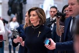 Image result for Nancy Pelosi Wearing Caduceus Pin