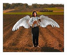 Image result for John Travolta Michael Angel Movie