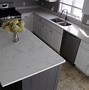 Image result for carrera countertops with white cabinets
