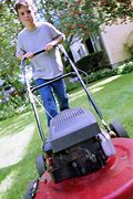Image result for Kid Mowing Lawn