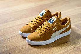 Image result for gold puma sneakers