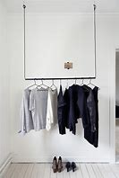 Image result for DIY Clothes Hanger On Sloped Wall