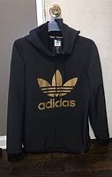 Image result for Yellow Adidas Hoodie with Red Stripes