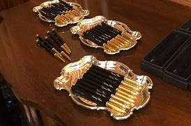 Image result for Impeachment Pens Shaped Like Bullets