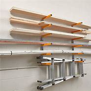 Image result for Ladder Hangers for Garage Wall