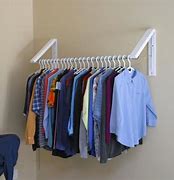 Image result for Brown Collapsible Wall Mounted Clothes Hanger
