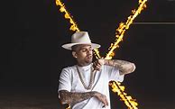 Image result for Photo of Chris Brown in White Outfit