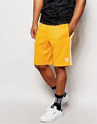 Image result for Yellow-Orange Adidas Shorts