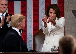 Image result for Nancy Pelosi Wearing Socialist Pin