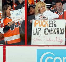 Image result for Hockey Fan Holding Sign