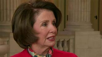 Image result for Picture of Nancy Pelosi with a Cancel Sign