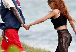Image result for Rihanna and Chris Brown Beach