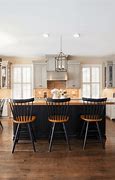 Image result for Dark Brown Kitchen Cabinets with Black Appliances