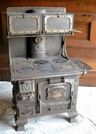 Image result for Vintage Cast Iron Kitchen Stove