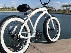 Image result for Swagtron EB11 Electric Cruise Bicycle With Shimano 7-Speed, Removable Battery & Beach Cruiser Tires, Black