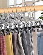 Image result for How to Hang Pants On Wooden Hangers