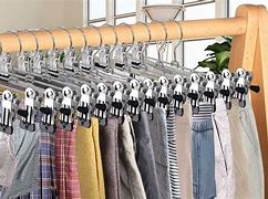 Image result for Designer Clothes for Men in a Hanger