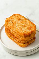 Image result for Ore-Ida Golden Hash Brown Oval Patties 2.8 Lb. Bag - 6/Case