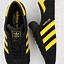 Image result for Black and Yellow Adidas Trainers