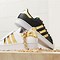 Image result for Women Adidas Black and Gold Tennis Shoes