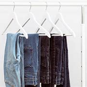 Image result for How to Hang a Pair of Pants On a Hanger with Clip