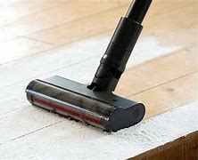 Image result for Shark Ultralight Corded Stick Vacuum With Self-Cleaning Brushroll - HZ251