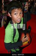 Image result for Kid Playing Guitar Hero