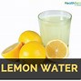 Image result for Glass of Warm Lemon Water