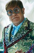 Image result for Elton John with Dollar Sign Glasses