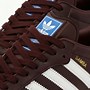 Image result for brown adidas sneakers