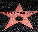 Image result for Olivia Newton-John with Bangs and without Hair