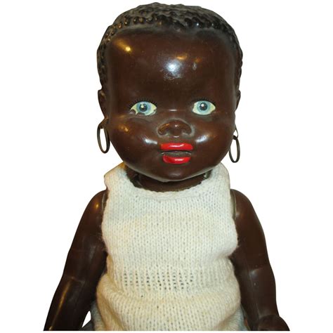 Adorable 1940's Black Hard Plastic Baby Doll with Pronounced Features  