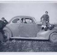 Image result for Soldiers Hanging On Cars