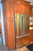 Image result for Kitchen Cabinets above Refrigerator