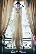 Image result for Ladies Dresses On Hangers
