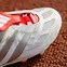 Image result for White and Black Adidas Soccer Cleats