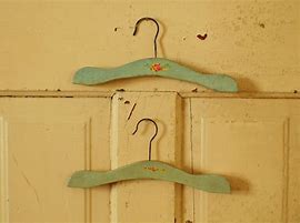 Image result for Wooden Vintage Baby Hangers