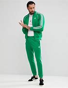Image result for Adidas Track Suit with Gold Stripes