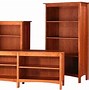 Image result for Wooden Bookcases with Doors