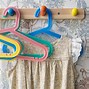 Image result for plastic clothing hanger for children
