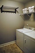 Image result for Laundry Room with Folding Counter and Hanging Clothes Rack