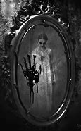 Image result for evil women looking in the mirror