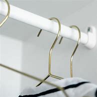 Image result for gold wire clothing hanger