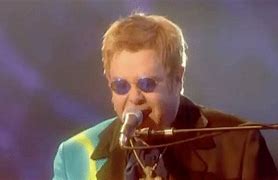 Image result for Elton John 80s GIF