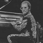 Image result for Elton John in Big Glasses