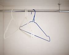 Image result for Plastic Clothes Hangers Red Blue Yellow