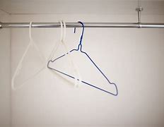 Image result for Clothes Hanger Cabinet