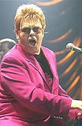 Image result for Elton John Playing Tennis 90s