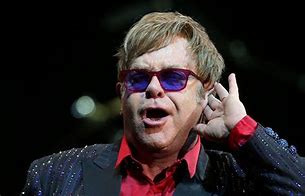 Image result for Elton John 70s Famous Pic
