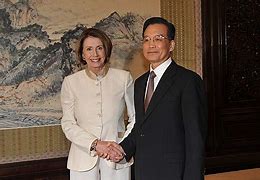 Image result for Newest Nancy Pelosi in Yellow Dress